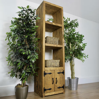 Discover the rustic charm of the Buckland Tall Rustic Bookcase Display Cabinet with Doors, showcasing solid wood craftsmanship.