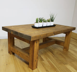 Personalise your farmhouse-inspired decor with the Rustic Sopley Coffee Table: A custom-designed, low-profile centrepiece crafted from solid wood for a touch of bespoke charm.