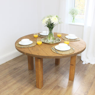 Elevate your dining space with the Bexley round dining table, a solid wood farmhouse table exuding modern rustic charm. Handmade with character and durability in mind, our sustainable dining tables are built to order, embodying the perfect blend of style and sustainability.