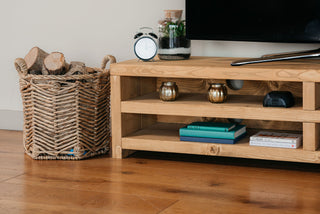 A close up image of our Rustic mMaynard tv unit finished in a medium oak finish, handmade by Rustic Dreams