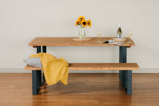 Revamp your dining room with the Moorland Handcrafted Industrial Dining Table: Merging rustic finesse with sturdy metal legs, for a trendy, urban vibe.
