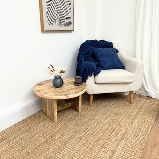 Introduce eco-friendly charm to your living room with our Handcrafted Reclaimed Low Round Coffee Table: A rustic centerpiece crafted with sustainability in mind.