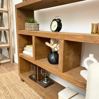 Transform your space with the Landford Rustic Handmade Shelving Bookcase. Handcrafted from solid wood, this rustic bookcase offers ample storage and timeless charm.