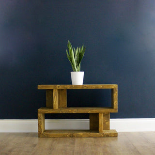 Add character to your space with the Litton Rustic Handmade Solid Wood Side Table. Crafted from reclaimed wood, this small table exudes charm and functionality.