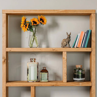 Introduce rustic elegance to your decor with the Rustic Ringwood Shelving Unit: Crafted from solid wood, it's a natural addition to any space.