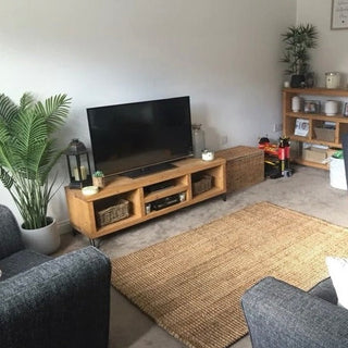 Elevate your living room with the Sway TV unit, a handmade rustic wooden entertainment unit designed to add both style and functionality to your home. Crafted from solid wood, this bespoke console unit features a large shelf for storage.