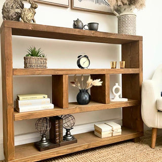 Transform your space with the Landford Rustic Handmade Shelving Bookcase. Crafted from solid wood, this handmade bookcase exudes rustic charm and offers ample storage for books, decor, and more. Perfect for adding character to your home decor.