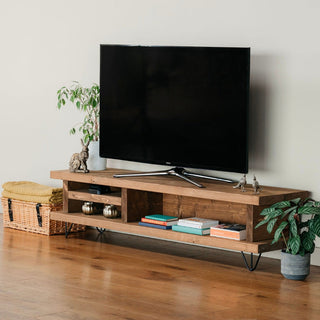 Introduce rustic charm with the Blissford TV Unit. Crafted from solid wood, it features stylish hairpin metal legs and a thoughtful design for efficient cable management. Elevate your home entertainment in style!