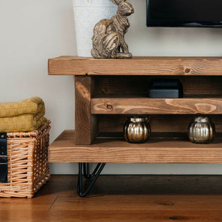 Close view of the Blissford TV unit showcasing its natural grain and solid wood construction. Handmade using traditional carpentry methods, this low TV unit is the perfect addition to your home entertainment setup, providing a stylish and durable solution for your living room media needs.