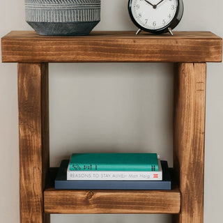 Introduce rustic charm with the Hinton rustic side table, crafted from solid wood. This small table is perfect for adding character to any space.