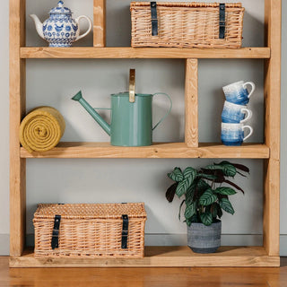 Elevate your decor with the Rustic Ringwood Shelving Unit: Crafted from natural solid wood, it adds rustic charm and organization to your space.