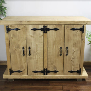 Enhance your aquatic display with the rustic charm of the handmade Blashford fish tank stand, featuring storage cabinets, crafted from solid wood.