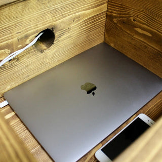 The Highwood TV unit showcases rustic solid wood, with ample storage and cable management in its drawer.