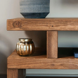 The Hartington TV unit, a charming entertainment piece for your living room, seamlessly combines rustic style and functionality.