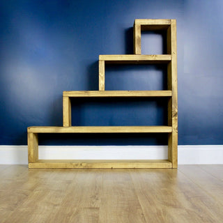 Enhance your space with the Brandside handmade rustic bookcase shelving unit, crafted from solid wood for timeless charm and versatile storage.