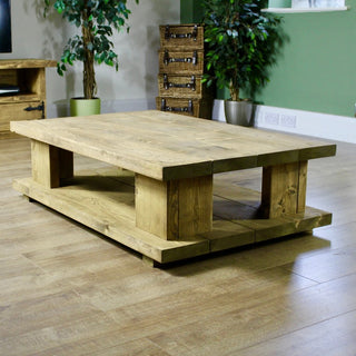 Introduce rustic charm to your living space with the Lepe Handmade Coffee Table, featuring solid wood craftsmanship and convenient drawer storage.