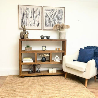 The Landford Rustic Handmade Shelving Bookcase. Crafted from solid wood, this handmade bookcase showcases rustic charm and offers functional storage. Perfect for organizing your books and displaying decor items. Add a touch of character to your room with this unique and stylish shelving unit.