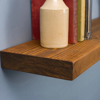 Handmade Wall Mounted Shobley Floating Shelf: Rustic charm meets practicality in this solid wood storage solution, ideal for displaying decor or organizing essentials.