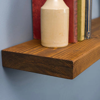 Discover the rustic elegance of the Handmade Wall Mounted Shobley Floating Shelf: Crafted from solid wood, this versatile storage piece adds charm to any room.
