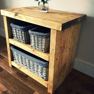Complete your bedroom ensemble with the Ripley Bedside Table: Handcrafted from solid wood, it offers storage shelves and rustic charm.