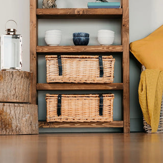 Add rustic charm to your space with the Highcliffe Solid Wood Rustic Tall Bookcase Shelving Unit. Handcrafted from solid wood for enduring elegance.