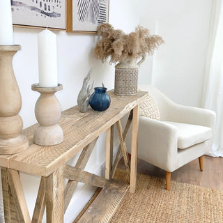 Discover rustic elegance with the Winford Solid Wood Reclaimed Console Table with Storage: Handcrafted from reclaimed wood, this custom piece brings natural beauty and functionality to your home.