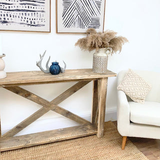 Discover the perfect blend of rustic charm and practicality with the Winford Solid Wood Reclaimed Console Table, providing ample storage while enhancing your entryway or living space.