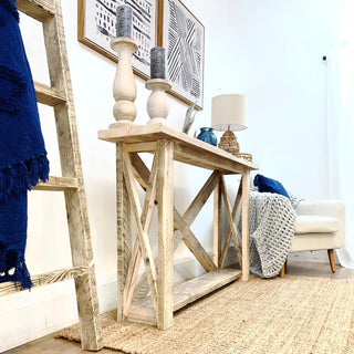 Winford Solid Wood Reclaimed Console Table with Storage: Handcrafted from salvaged wood, this custom piece offers natural beauty and ample storage, adding rustic charm to your home.