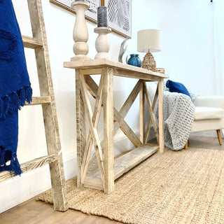 Explore the timeless appeal of the Winford Solid Wood Reclaimed Console Table with Storage: A handcrafted masterpiece, showcasing the beauty of salvaged wood while providing practical storage solutions.