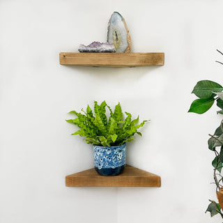Upgrade your space with Hatfield Solid Wood Rustic Corner Floating Shelves, crafted from reclaimed timber for a rustic touch.