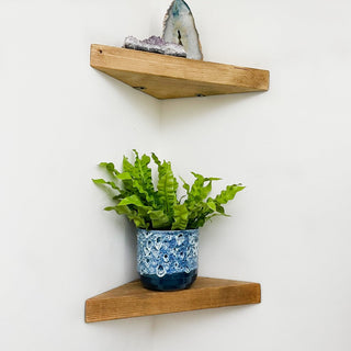 Transform your space with Hatfield Solid Wood Rustic Corner Floating Shelves, adding rustic charm and practical storage to any corner.