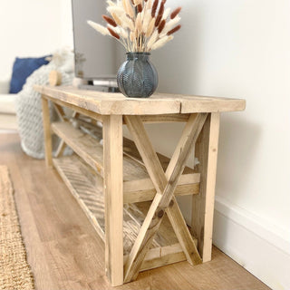 Winford Solid Wood Reclaimed TV Unit with Storage: Handmade in Hampshire from reclaimed wood, featuring a cross design and a shelf for soundbar and audio equipment. Bespoke and custom-crafted, showcasing natural wood beauty.