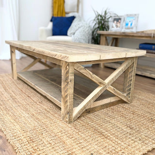 Experience rustic elegance with the Winford Reclaimed Solid Wood Coffee Table, a sustainable centerpiece boasting both style and practicality.