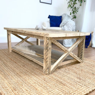 Experience the rustic allure of the Winford Reclaimed Solid Wood Coffee Table, a handcrafted centerpiece that seamlessly blends style and functionality in your living space.