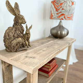 Add rustic charm to your living space with the Winford shelving unit, this versatile bookcase features shelves for storage, decor items in your living room, dining room, bedroom, or hallway. With its cross design, it adds a touch of modern farmhouse style to any cottage or home decor.
