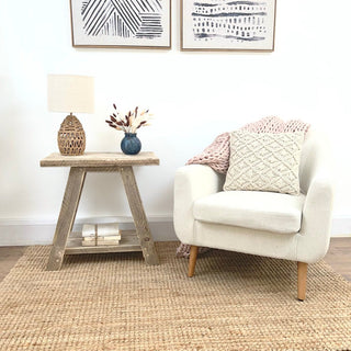 Crafted from reclaimed and distressed wood. This cottage-inspired reclaimed side table offers both style and storage, perfect for living rooms or as bedside tables. Made from solid wood, it exudes the natural charm of reclaimed furniture, adding warmth and character to any room.