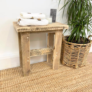 Ryde Reclaimed Solid Wood Small Side Stool: A compact, handcrafted wooden stool made from reclaimed materials, showcasing rustic charm and sustainable craftsmanship.