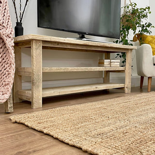Infuse eco-friendly charm into your living space with the Ryde Handcrafted Reclaimed Wood Media Unit: A salvaged wood construction featuring open shelves, ideal for a stylish TV or media setup.