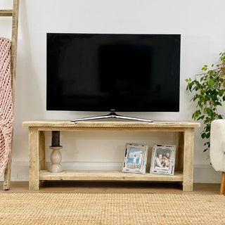 Discover the rustic allure of the Winford Solid Wood Reclaimed TV Unit with Storage, a stylish addition to your living space that combines vintage charm with modern functionality.