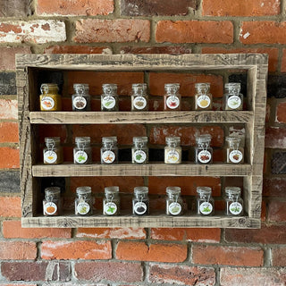 Enhance your kitchen organization with our reclaimed spice rack, a rustic seasoning holder crafted from salvaged wood.
