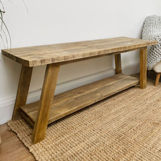 The Yarmouth Solid Wood Reclaimed Shoe Rack Bench: A blend of rustic charm and practicality, this handcrafted piece offers efficient shoe storage with a larger gap design for added convenience.