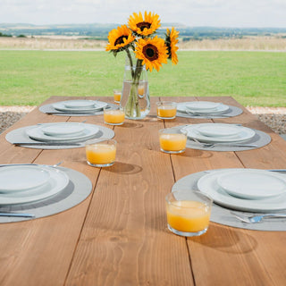 Introduce sophistication to your dining area with the Moorland Handmade Industrial Dining Table: A harmonious mix of rugged elegance and sturdy metal legs, ideal for modern living spaces.