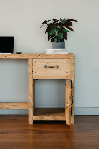 Enhance your workspace with the Marina Solid Wood Rustic Desk: Combining practicality and rustic charm, this desk offers ample storage and a timeless aesthetic.
