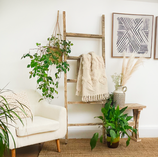 Introduce rustic charm to your home with the Chapwell blanket ladder, a decorative wooden ladder perfect for displaying throw blankets and quilts. This leaning ladder adds a touch of elegance to your decor while providing a functional storage solution.