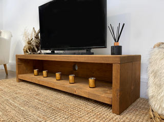 Elevate your living room with the Woodside TV unit, a handmade rustic entertainment unit offering versatility for your TV media needs. Embrace the natural charm of wooden furniture with this bespoke piece.