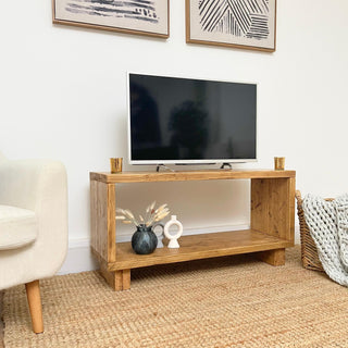 The Cadland Reclaimed TV Media Unit with Open Storage, crafted from reclaimed wood, offering rustic charm and ample media storage space.
