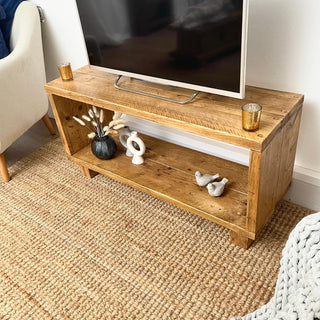 Transform your home with the Cadland Reclaimed TV Media Unit, offering open storage for media essentials. Crafted from reclaimed wood for a rustic touch.