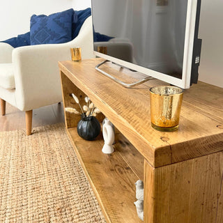 The Cadland Reclaimed TV Media Unit, showcasing open storage for multimedia equipment. Handcrafted from upcycled wood.