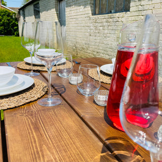 Discover the Harlow Handcrafted Reclaimed Wooden Garden Dining Table, a sustainable outdoor furniture piece, crafted from reclaimed wood for rustic elegance.