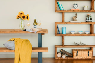 Image consisting of a Rustic Bookcase and Rustic dining Table finished in a dark oak wax handmade by Rustic Dreams 